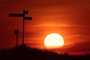 About Counselling. Signpost in sunset